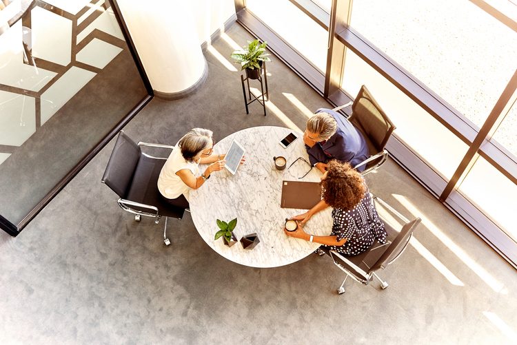 business people at table from above